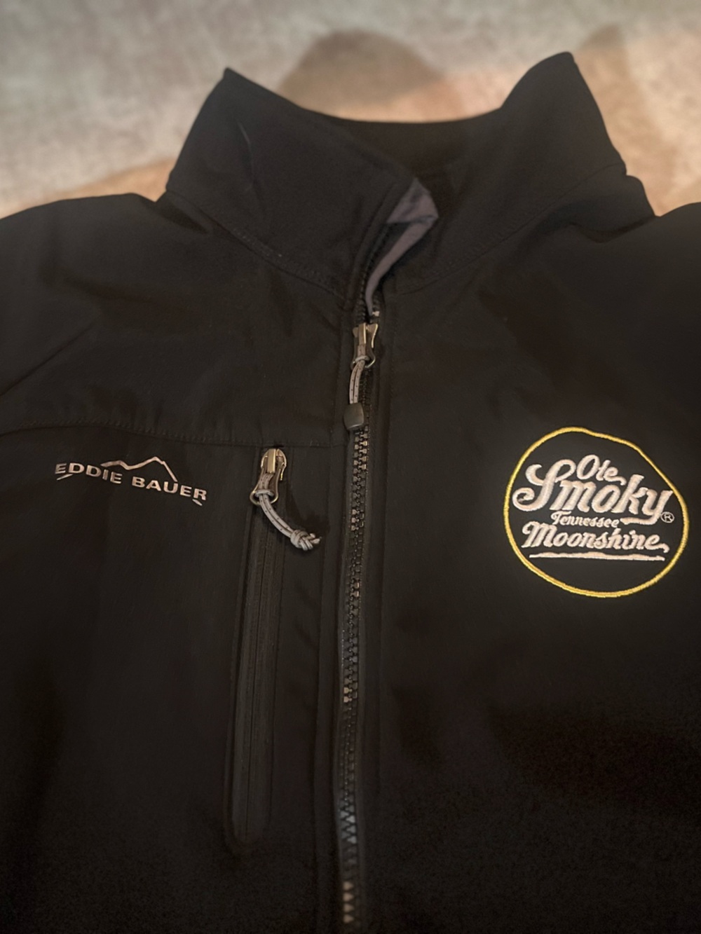 Eddie Bauer Black Softshell Jacket with Ole Smoky Moonshine Embroidered Badge